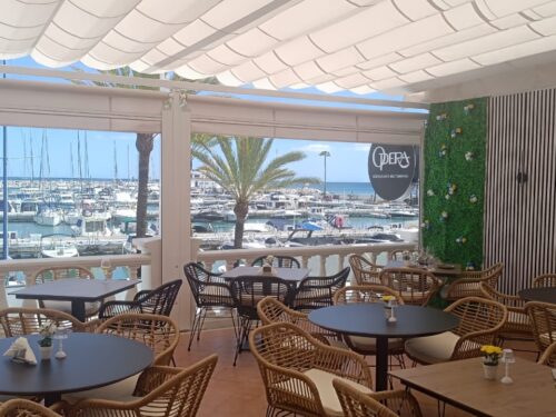 Installation of a retractable awning on a restaurant terrace in Puerto de la Duquesa, Sabinillas